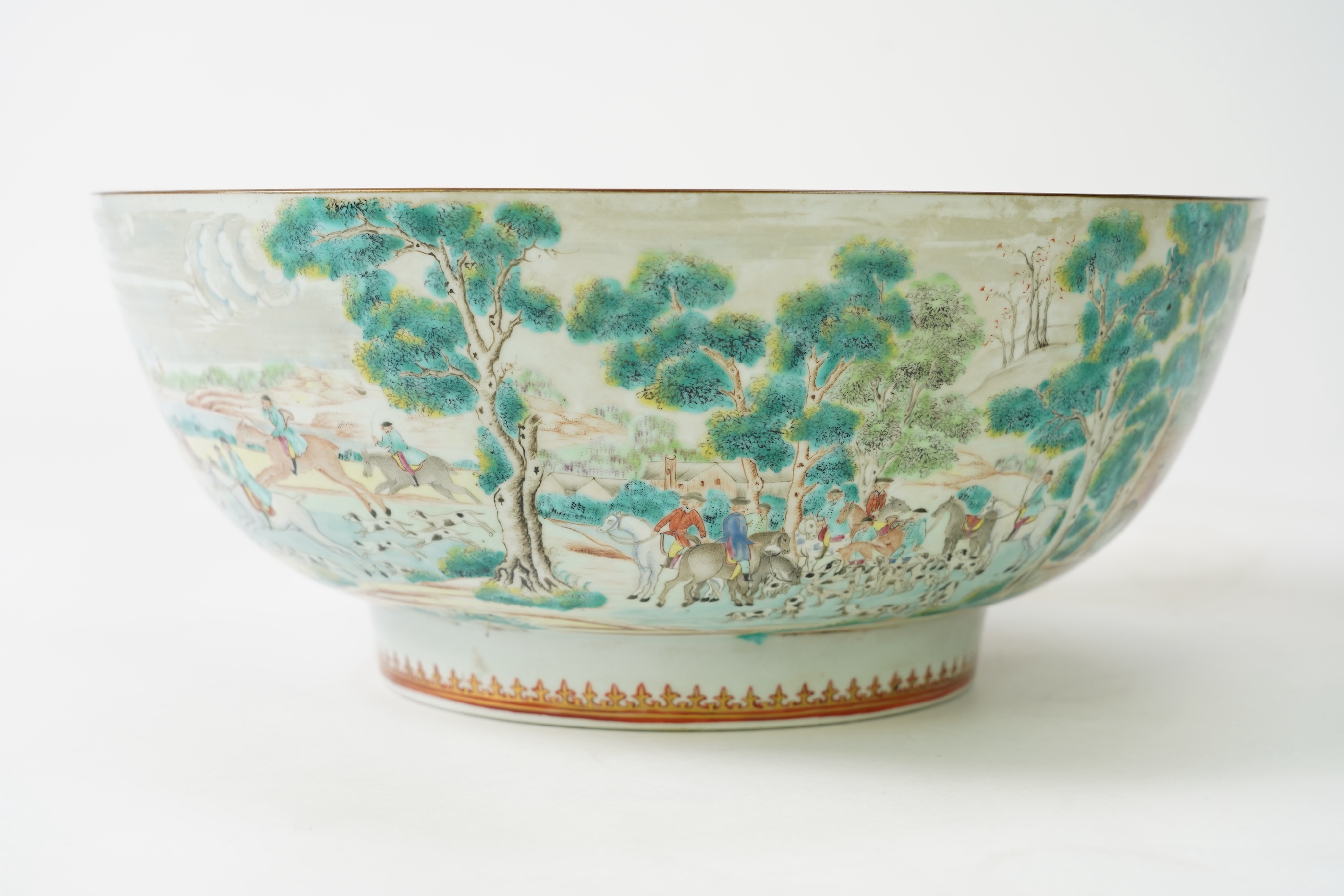 A large Chinese European subject ‘hunting’ punch bowl, Qianlong period